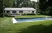 Large back yard with heated gunite pool