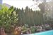 Mature landscaping surrounds property