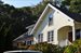 walk to the beach from this renovated charmer
