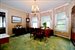 Spacious Dining Room w/ Wood Flooring Under Carpet