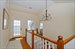 Upper hallway with access to waterside porch