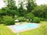 landscaped yard with pool