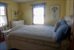 one of three bedrooms