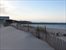 beach with dining, music, & play area.