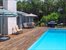 heated pool and wood deck