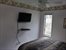 Guest bedroom 1 with flat screen TV