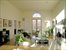 high-ceilinged living room