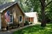 Newly shingled, pretty landscaping