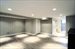Fully finished lower level with laundry room and full bath + exercise room and media center