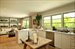 View of kitchen back toward seating area