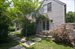 Back of house with stone shower