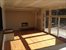 Great room w/Fireplace, doors lead to deck/water